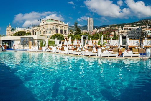 Poolside seating area at Nikki Beach Monte Carlo, Fairmont Hotel